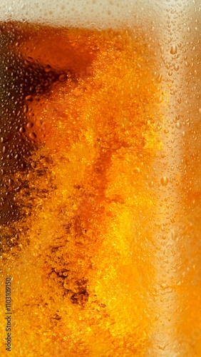 Close-up of beer pouring in...