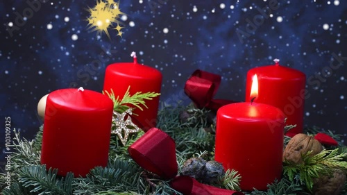 1. of Advent, Advent wreath on a turn table, igniting first candle 