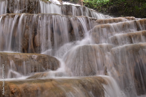 Travel to waterfalls during the rainy season, The tiers of the waterfall contrast beautifully with the sky, Nature itself is the best physician