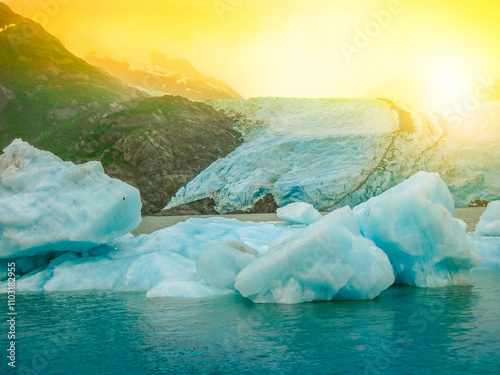 Melting of the famous Portage Glacier in Portage Lake near Anchorage, Alaska, United States. Concept of climate change and global temperature warming. Fog in the morning. photo