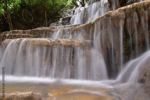 Travel to waterfalls during the rainy season, The tiers of the waterfall contrast beautifully with the sky, Nature itself is the best physician