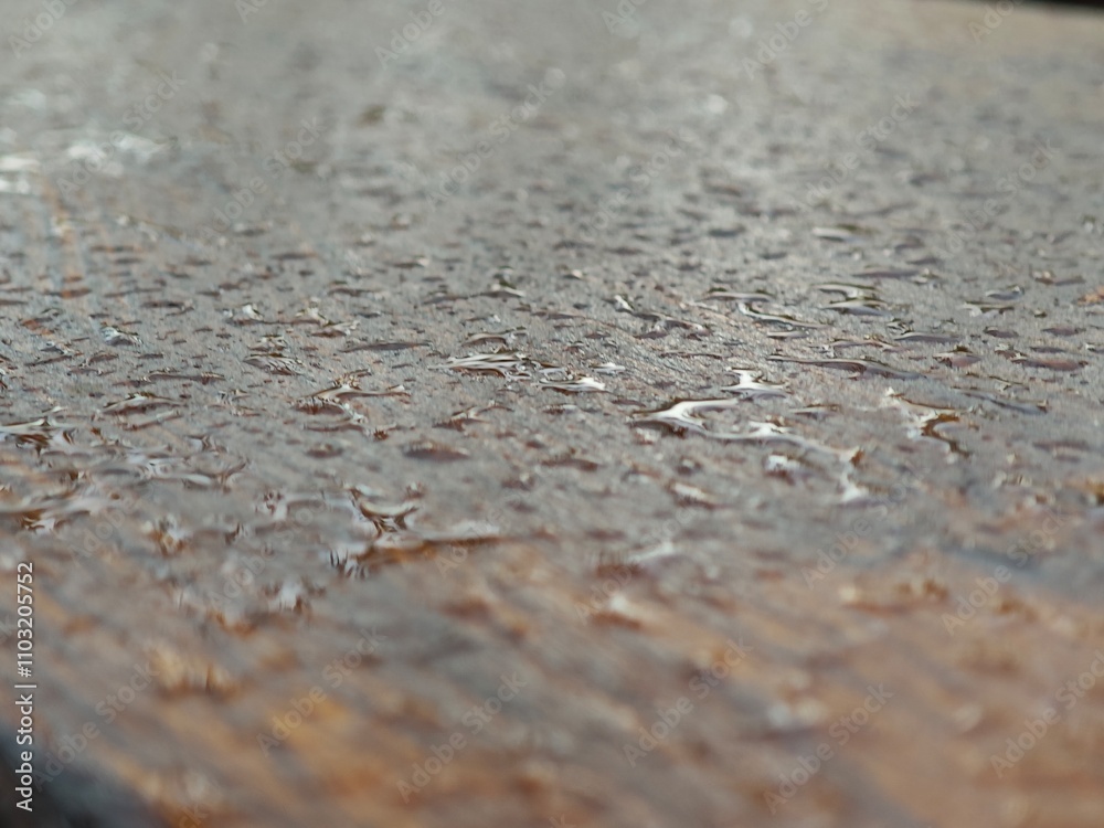 Water droplets on the surface of a concrete floor. Selective focus. Water droplets on the surface of a concrete floor. Selective focus.