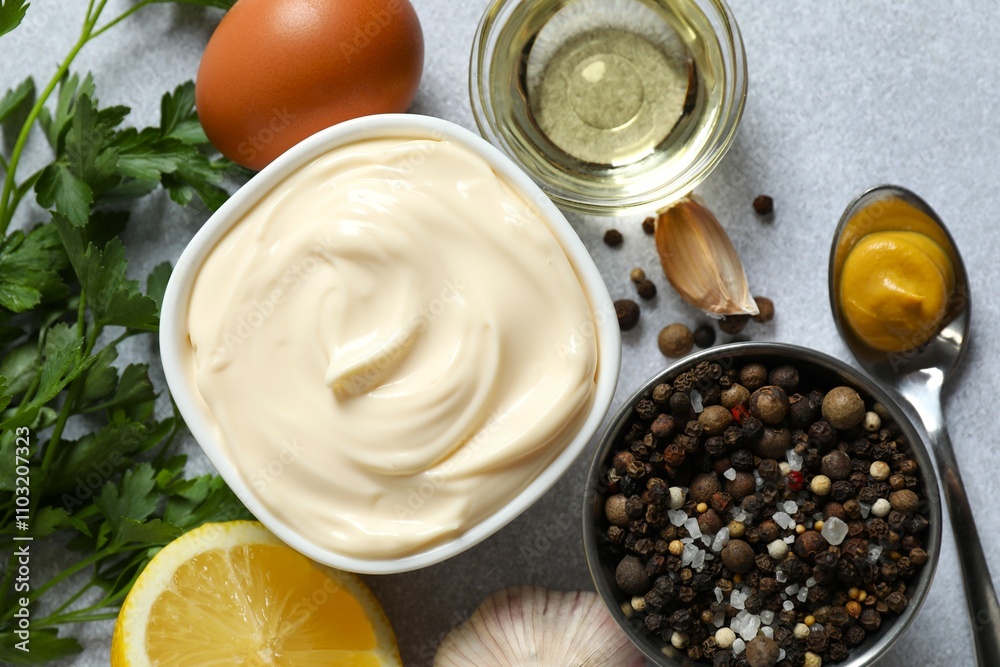 Bowl with mayonnaise on gray background Bowl with mayonnaise on gray background