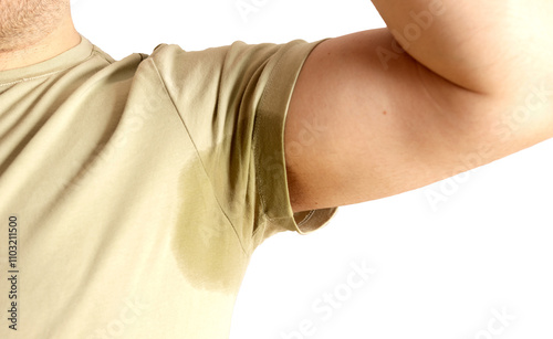 Принти на полотні Sweaty armpit on beige shirt highlighting excessive perspiration issues