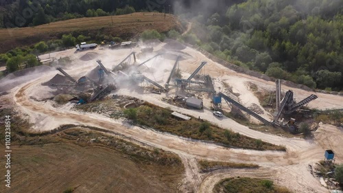  Aerial view of stone jaw crusher plant. Sand making plant and belt conveyor in mining quarry