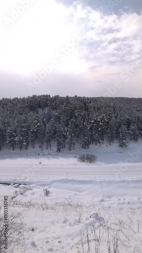 Wallpaper Mural Kars Sarikamis vertical view from window of a train, snowy plain Torontodigital.ca
