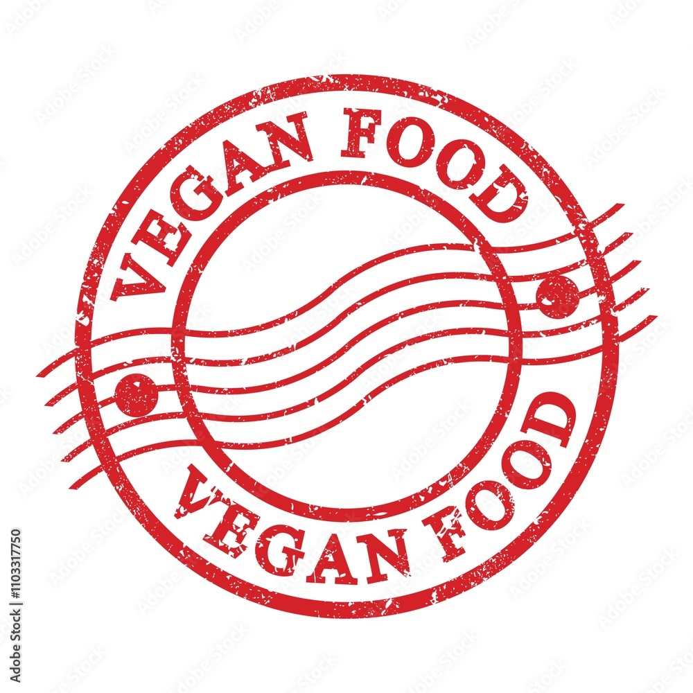 VEGAN FOOD, text written on red postal stamp. VEGAN FOOD, text written on red postal stamp.