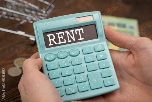 Calculator with the word RENT on the display photo