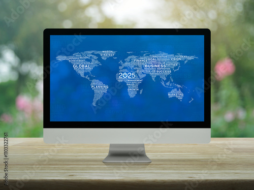 Fototapeta Naklejka Na Ścianę i Meble -  Start up business icon with global words world map on computer screen on table over blur park, Happy new year 2025 global business start up online concept, Elements of this image furnished by NASA