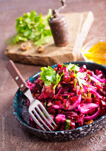Vinegret- traditional Russian beet salad and vegetables on plate