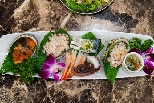 high angle view of various seafoods on the plate photo