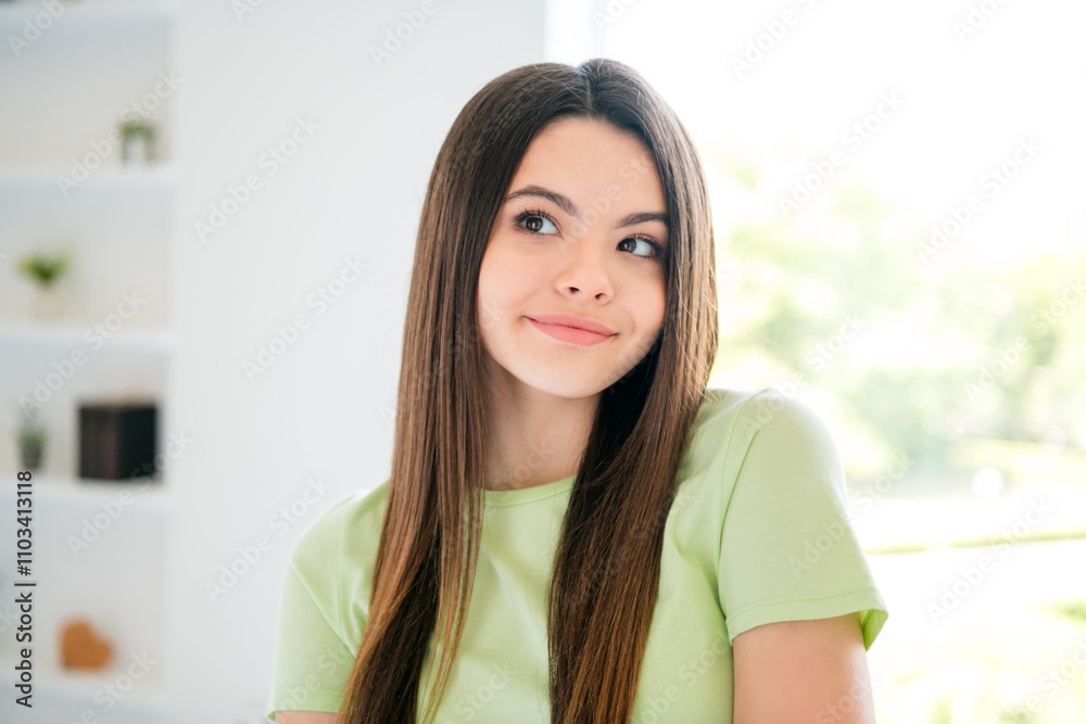 Young woman with charming smile in a cozy kitchen setting, enjoying daylight indoors and embracing casual comfort Young woman with charming smile in a cozy kitchen setting, enjoying daylight indoors and embracing casual comfort