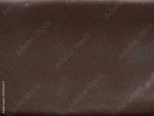Dark brown leather texture close-up.