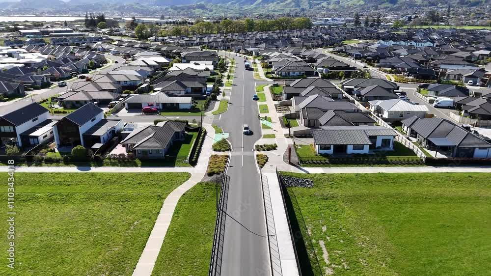 Aerial view of suburban neighborhood with beautiful homes and green spaces, Richmond, New Zealand.