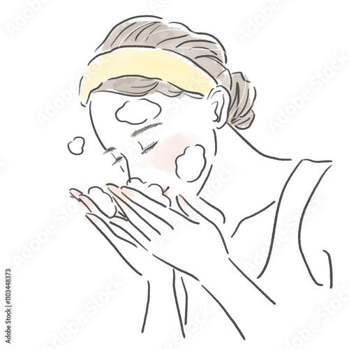 泡で洗顔をしている女性の上半身