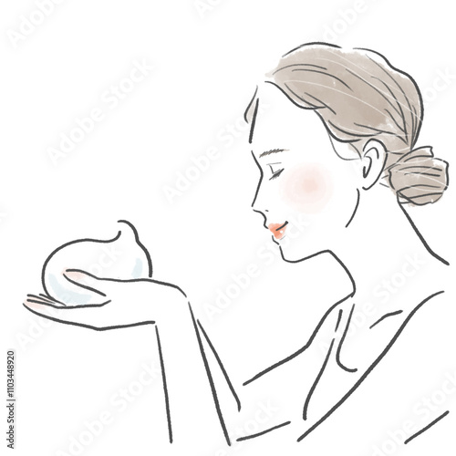 両手で泡を持っている笑顔の女性横顔の上半身