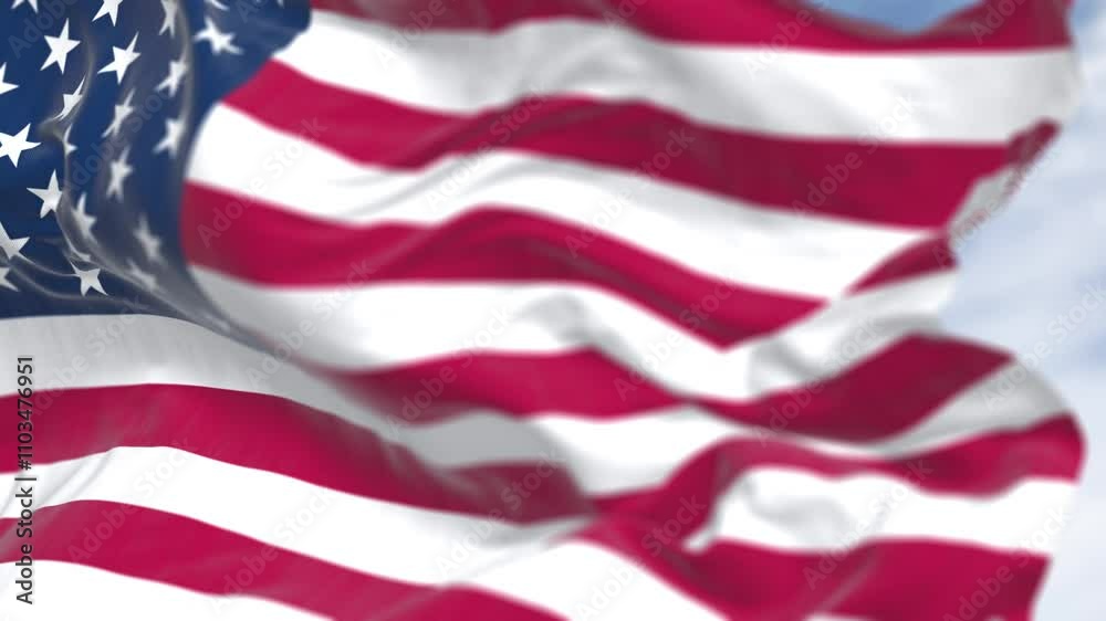 Close-up of the american national flag waving in the wind on a clear day