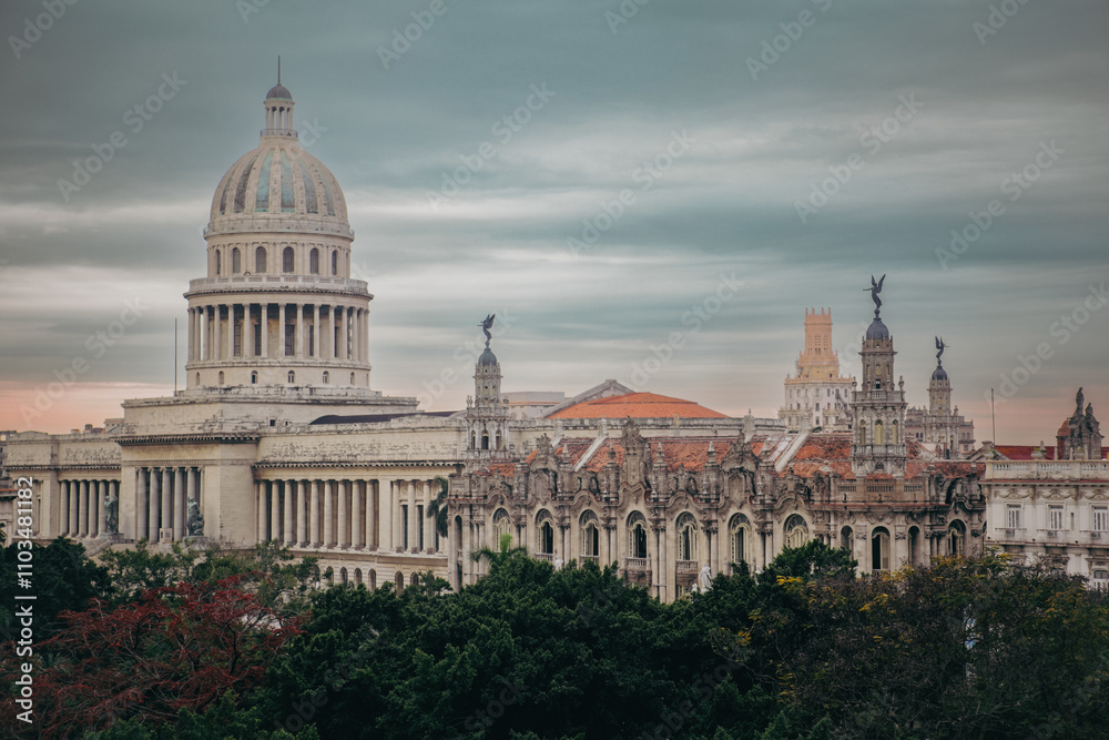 Obraz premium Historic architecture captures the essence of Havana Cuba at sunset against moody skies