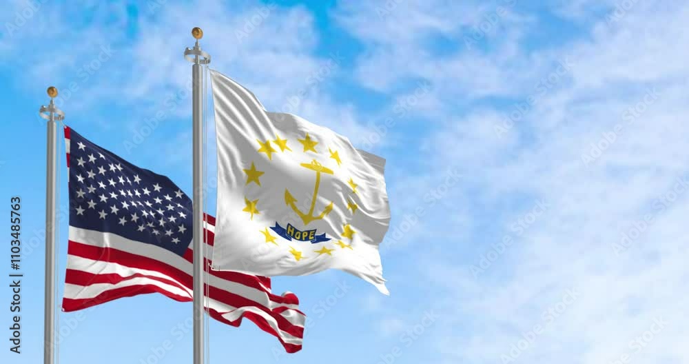 Rhode Island state flag waving with the american flag on a clear day