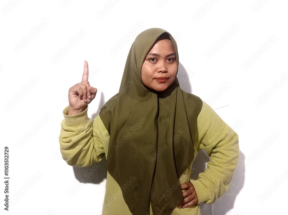 portrait of woman raises one finger portrait of woman raises one finger