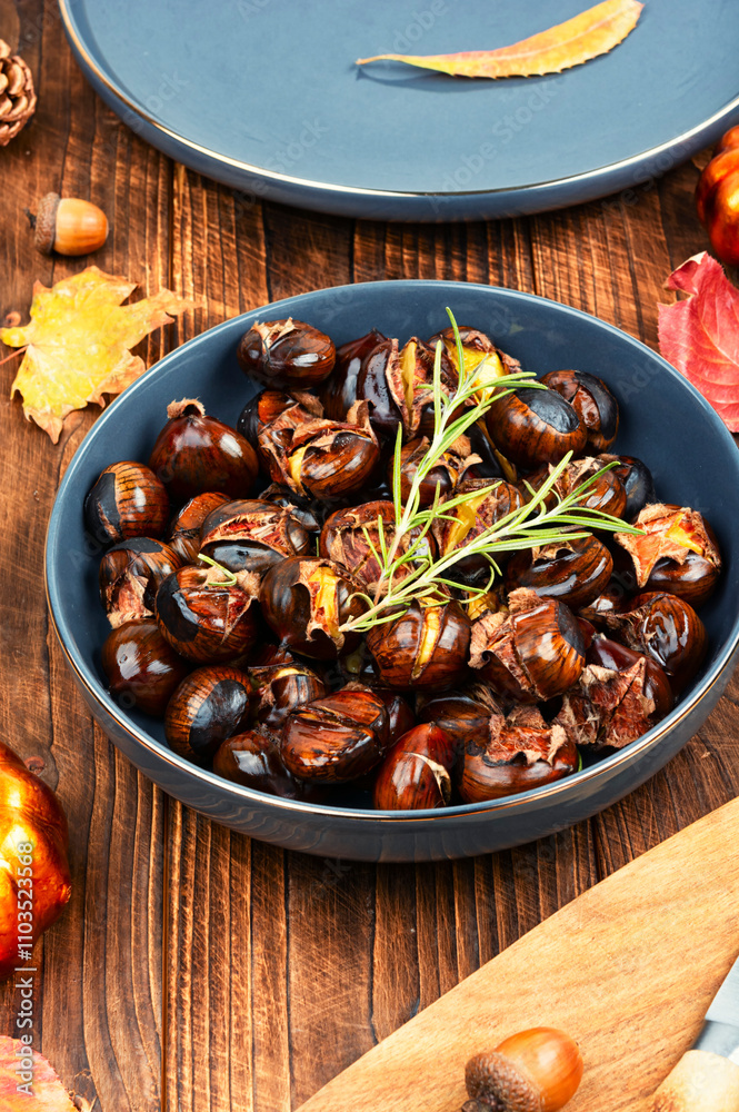 Fototapeta premium Charred roasted Chestnuts.