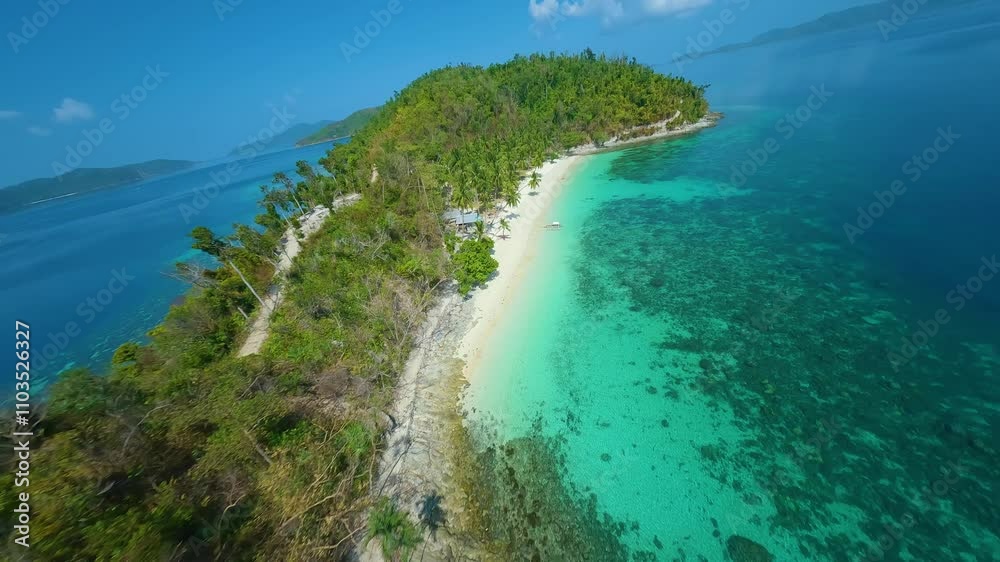 FPV drone video of Maxima Island Beach near Port Barton, Philippines. Fly over clear turquoise waters, sandy shores, and lush greenery, capturing the stunning natural beauty of this tropical getaway. FPV drone video of Maxima Island Beach near Port Barton, Philippines. Fly over clear turquoise waters, sandy shores, and lush greenery, capturing the stunning natural beauty of this tropical getaway.