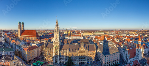 scenic view to famous church of our lady - german - Frauenkirche - in Munich with new town hall and marienplatz