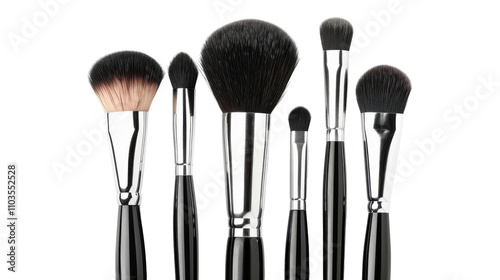 A set of six professional makeup brushes arranged elegantly on a clean white surface ready for beauty application or artistry work.