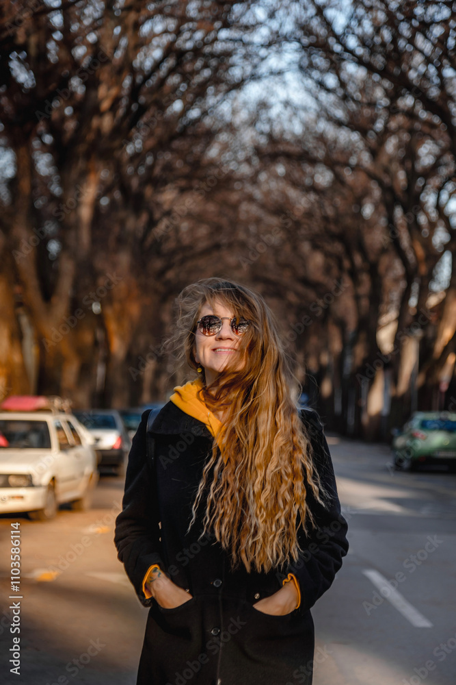Happy Smiling Woman Walking in Autumn Street