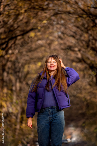 Happy Woman Walking in Autumn City Street