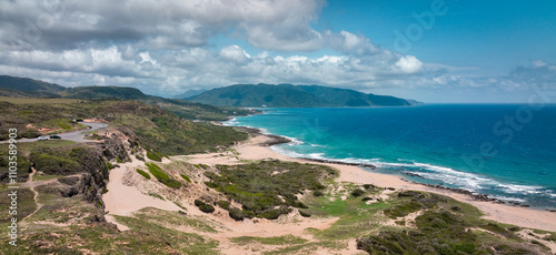 Scenic view of Longpan Park in Taiwan showcasing coastline and mountains on a sunny day photo