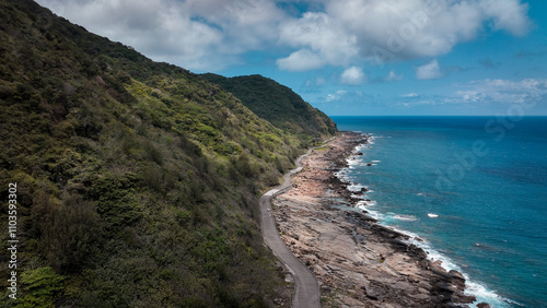 Breathtaking coastal view at Jialeshuei scenic area in Taiwan with winding roads and lush hills