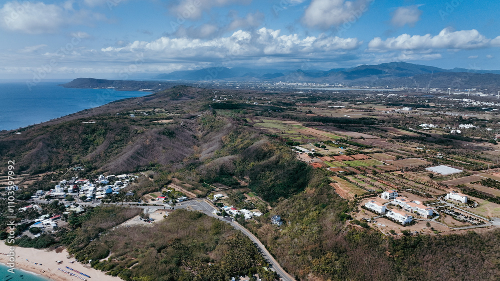Aerial view of Taiwan coastline and lush green landscapes during a clear day Aerial view of Taiwan coastline and lush green landscapes during a clear day