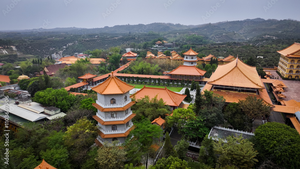 Fototapeta premium Aerial view of Fo Guang Shan Buddha Complex features stunning architecture and serene scenery