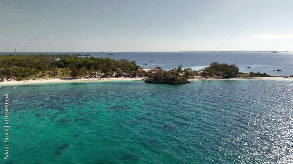 Aerial panning white tropical Langub beach coastline sea rural village landscape in Malapascua Island Aerial panning white tropical Langub beach coastline sea rural village landscape in Malapascua Island