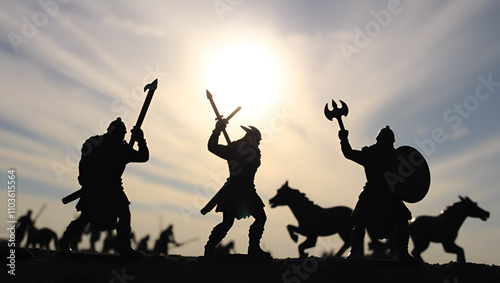 Silhouettes of attacking Vikings (vintage plastic toy soldiers) against sky with cirrus clouds and bright sun, Odin, Valhalla and Asgard theme, Old Norse mythology photo