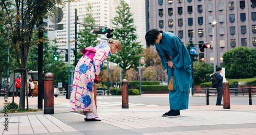 Εκτύπωση καμβά Respect, japanese people and bow for greeting, culture and welcome with kimono in city
