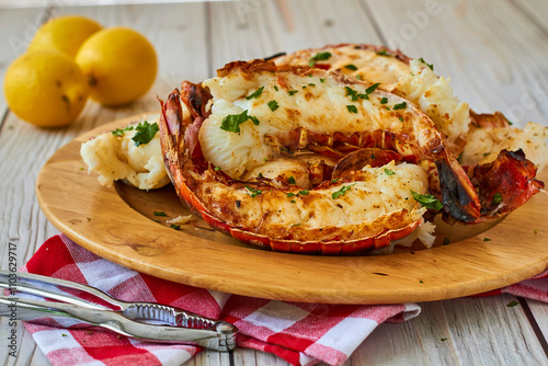 broiled rock lobster tails served with butter and fresh lemon juice