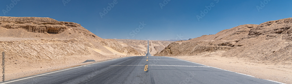 The highway going through Yadan geoform in Qinghai, China The highway going through Yadan geoform in Qinghai, China
