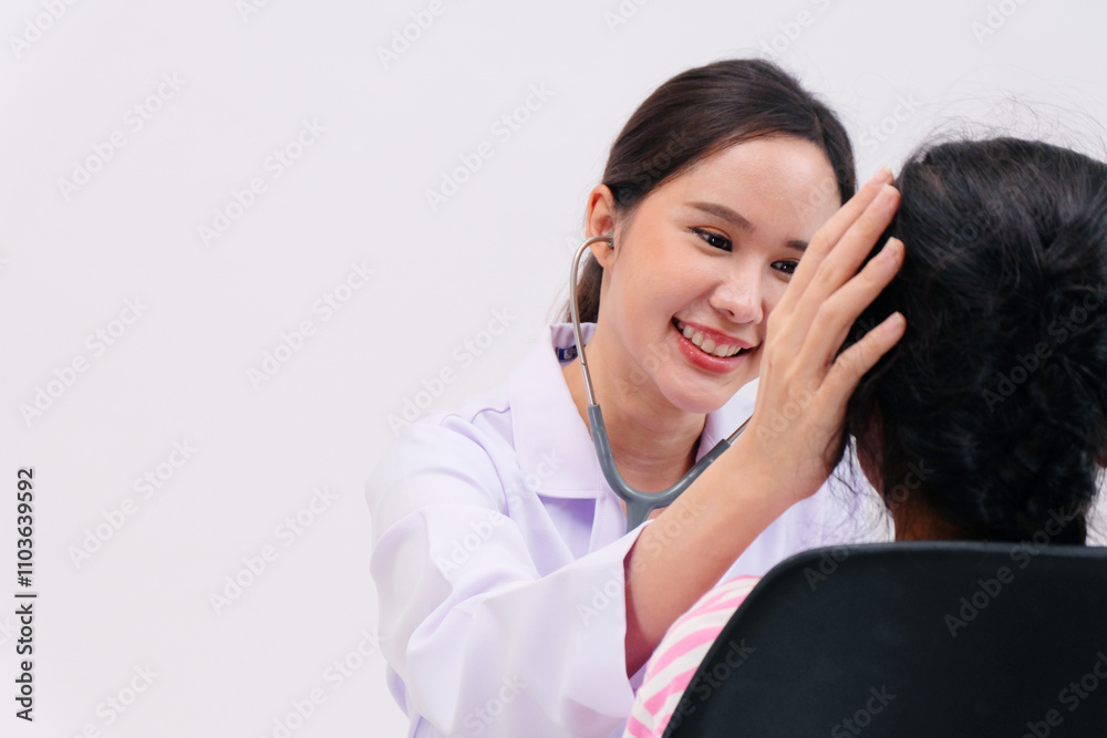 Female doctor examining sick girl. Concept of doctor and patient. Female doctor examining sick girl. Concept of doctor and patient.