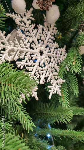 Decorated Christmas tree with festive toys Christmas atmosphere.