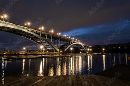 Stockholm, Sweden A view of the landmark Western Bridge, Vasterbron, at night connecting Kungsholmen to Sodermalm. photo