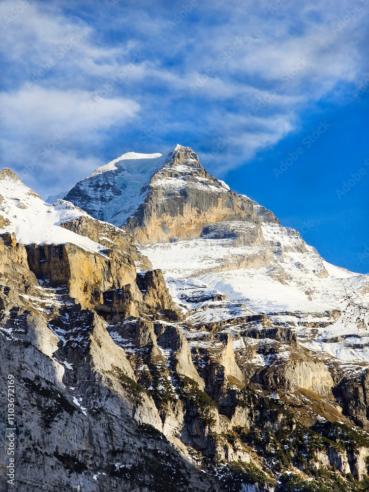 Obraz premium Snow-Capped Mountain Peak. Alpine Mountain in Winter