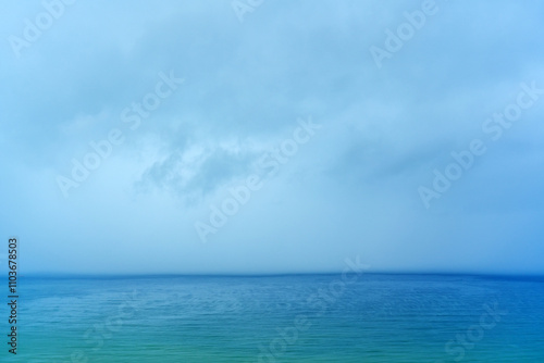 Downpour rain sea wall falling into the sea