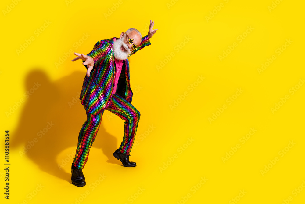 Eccentric elderly gentleman in a vibrant striped suit dancing joyfully against a bold yellow backdrop Eccentric elderly gentleman in a vibrant striped suit dancing joyfully against a bold yellow backdrop