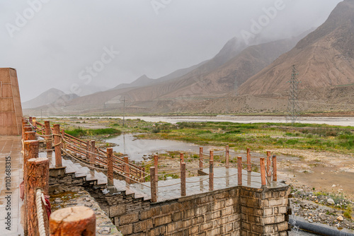 View on the river and mountain pass along Tibet - Qinghai highway, Kunlun mountains photo