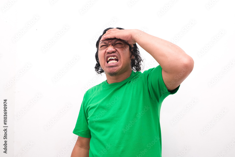 Fototapeta premium Asian man gesture who is feeling headache or migraine and vertigo isolated on white background