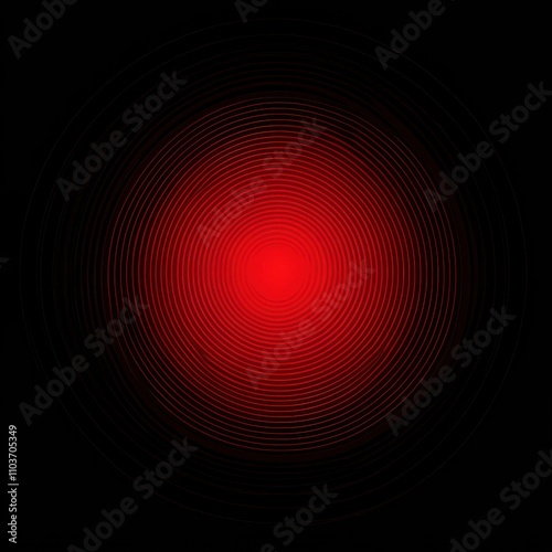 Abstract concentric red circles on a black background, creating a mesmerizing effect.