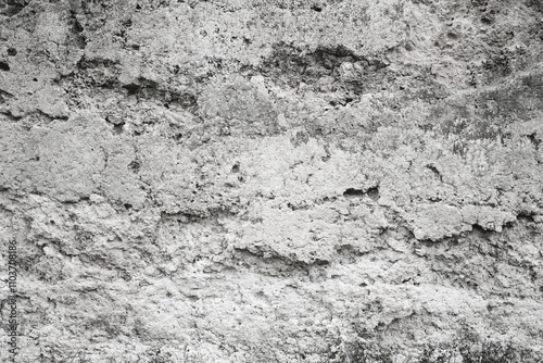 Empty grey rough stone wall on cave for abstract background and texture. beautiful patterns, space for work, banner, wallpaper close up.