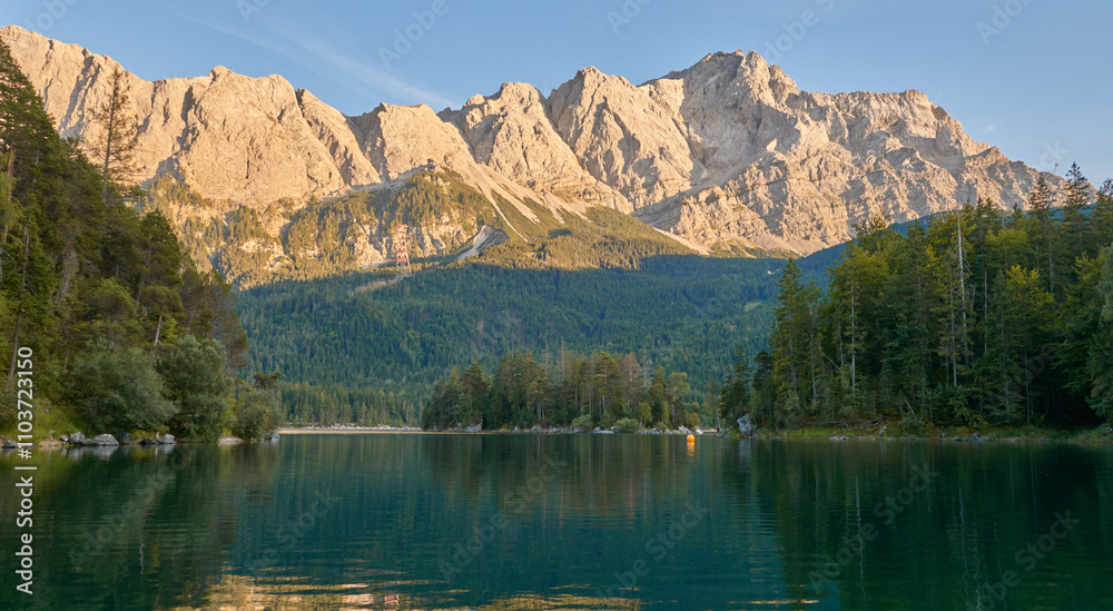 Scenic View of Eibsee Lake with Zugspitze Mountain at Sunset in Bavaria, Germany. Stunning Eibsee Lake with Zugspitze Reflection at Sunset in Bavaria, Germany. Tranquil Alpine Scene Captures the Scenic View of Eibsee Lake with Zugspitze Mountain at Sunset in Bavaria, Germany. Stunning Eibsee Lake with Zugspitze Reflection at Sunset in Bavaria, Germany. Tranquil Alpine Scene Captures the